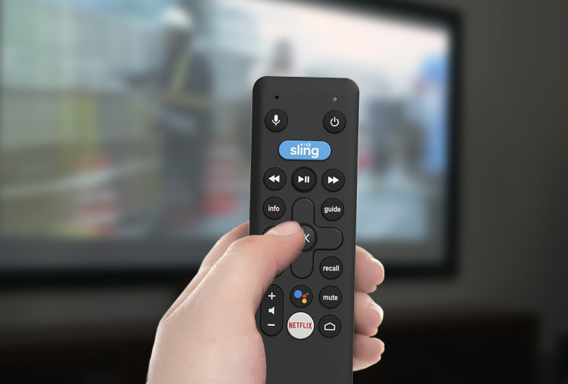 Hand using AirTV Mini remote